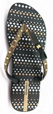 Ojota negra con moño y detalles dorados