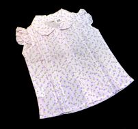Camisa Estampada Con Flores Sin Mangas Cuello Baby Alforzada