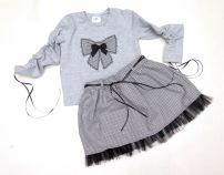 Conjunto Remera y Pollera Con Aplique de Moño. Vestir