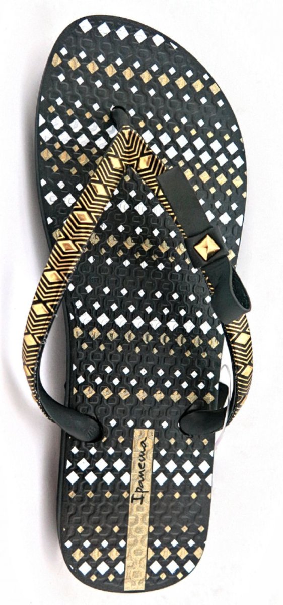 Ojota negra con moño y detalles dorados