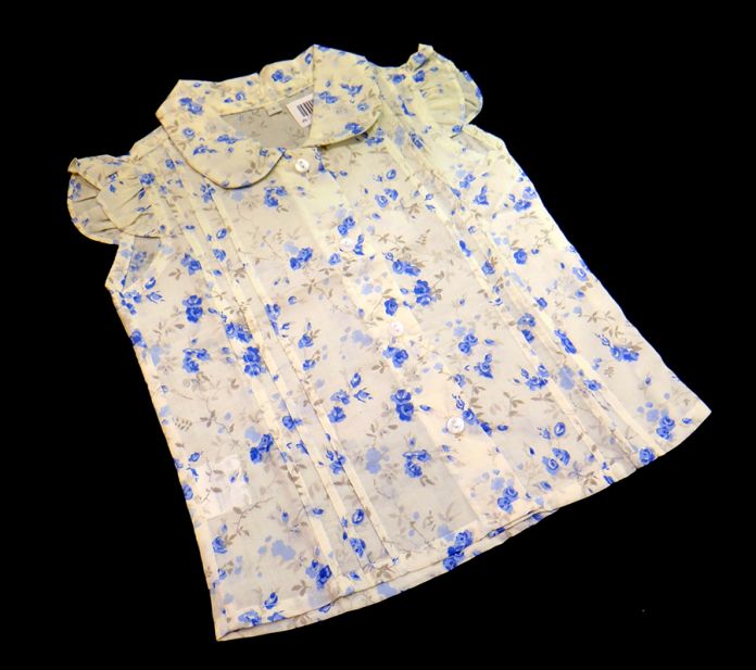 Camisa Estampada Con Flores Sin Mangas Cuello Baby Alforzada