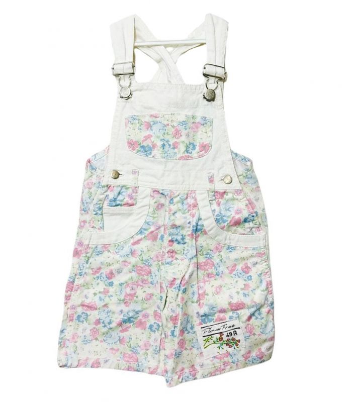 Jardinero de gabardina con flores corto