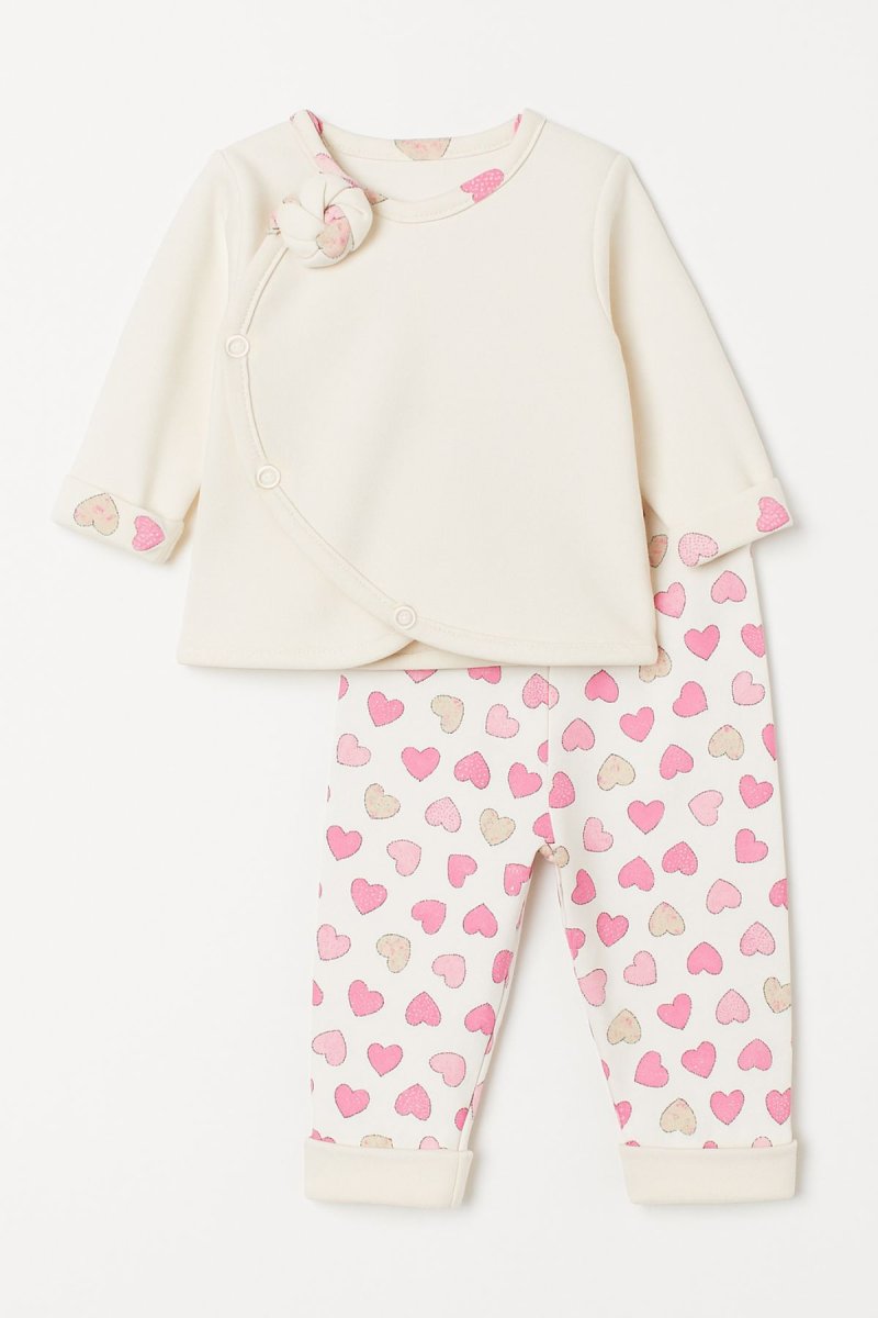 Conjunto Algodon Reversible Campera y Pantalon Sin Pie Estampado de Corazones o Flores