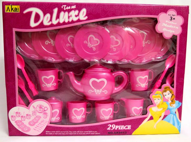 Juego de te con platitos, tazas, tetera, cubiertos en caja con visor