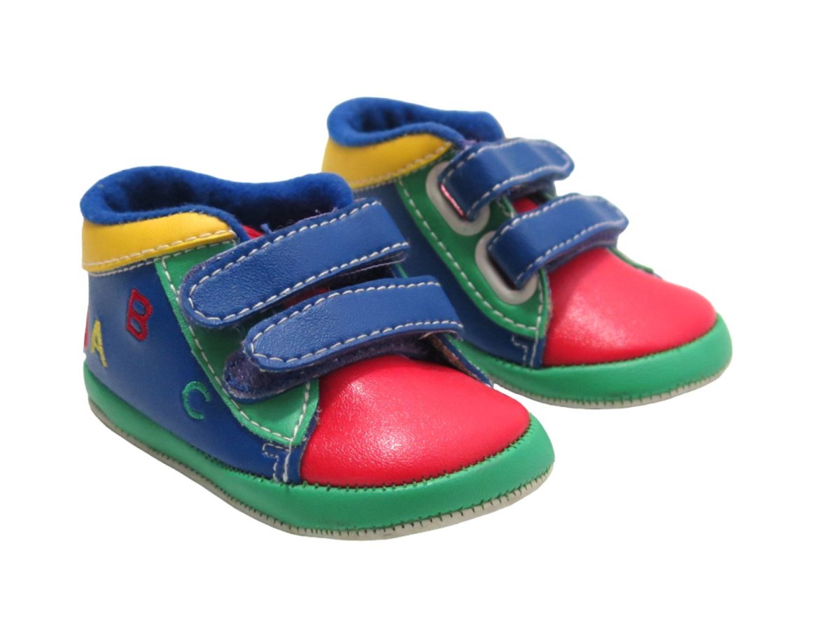 Botita cuerina con velcro combinada