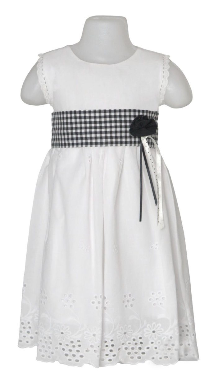 Vestido Broderie con cinta cuadrille y flor