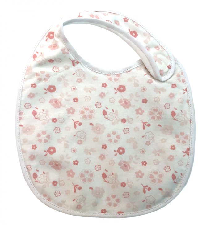 Babero Tricapa: Algodon Doble Y Plastico Floreado Con Velcro