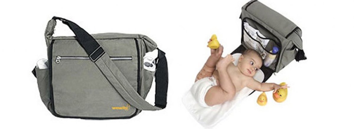 Bolso cambiador de tela impermeable, y cierre horizontal en la tapa. 1 correa.