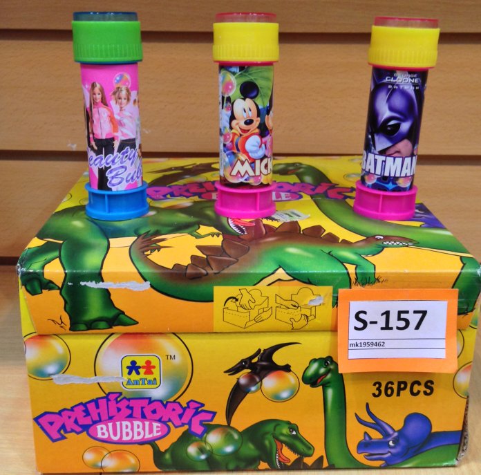 Burbujero prehistoric bubble en forma de tubo con personajes de dibujitos y tapa con laverinto