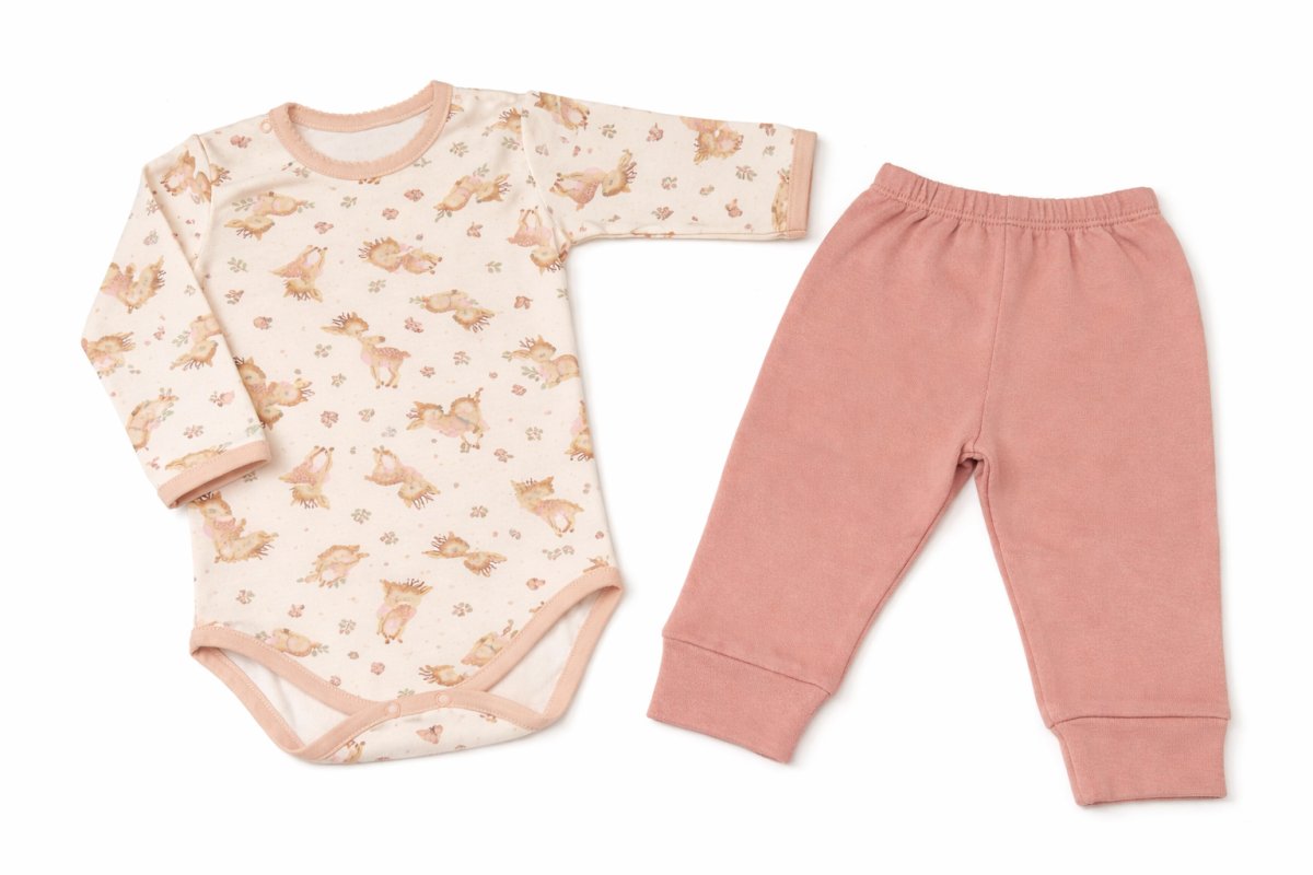 Conjunto Medio Osito Sin Pie y Body Manga Larga Estampada Dinodaurios